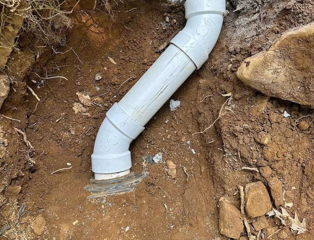 A white pipe on the ground
