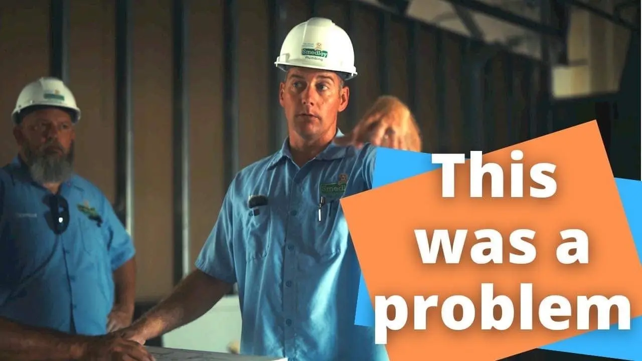 An image of two men wearing construction hat with a text "This was a problem"