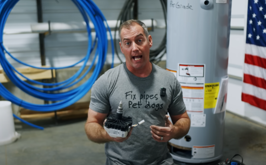 Technician analyzing water heater