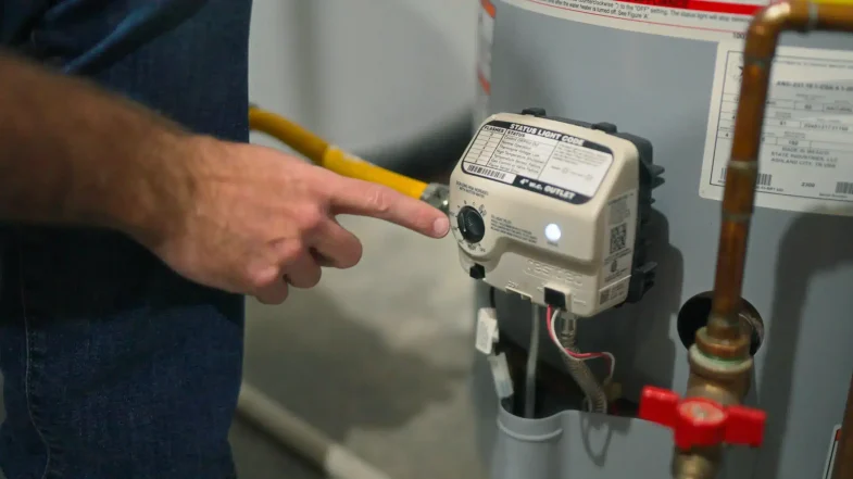 Plumber Checking The Status of the Water Heater